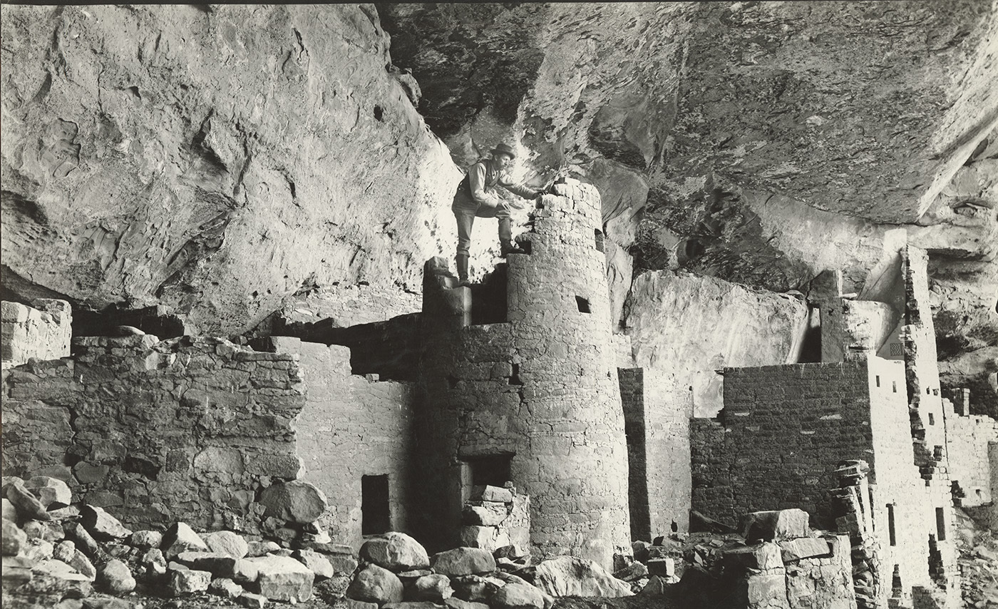 National-Parks_Examining-the-ruins-at-the-Cliff-Palace-Mesa-Verde-National-Park-circa-1900