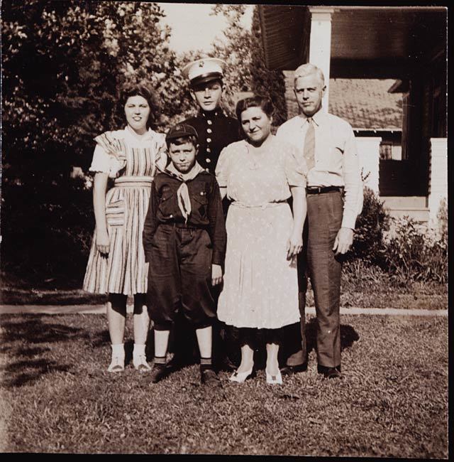 Phillips family photo at Monterey Place, May 1942. Sid poses in Marine blues next to Katharine.
