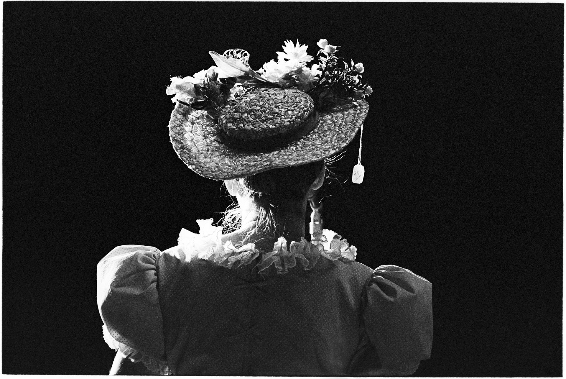 Closeup image of Minnie Pearl on stage