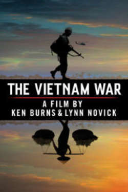 The poster for 'The Vietnam War: A Film By Ken Burns & Lynn Novick.' It shows a silhouetted American soldier standing above the film's title, with his reflection being that of a Vietnamese farmer carrying bales of rice on his shoulders. There is a silhouetted helicopter in the sky, which has a dramatic orange and blue sunset.