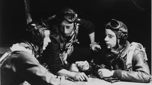 Luverne's Quentin Aanenson, left, prepares for the next mission. August 3, 1944. | Luverne, Minnesota