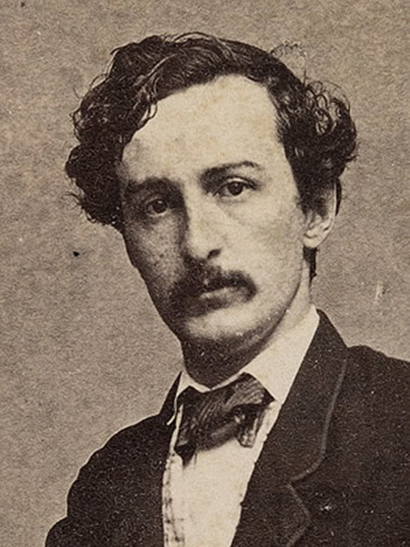 A sepia-toned photo of John Wilkes Booth.